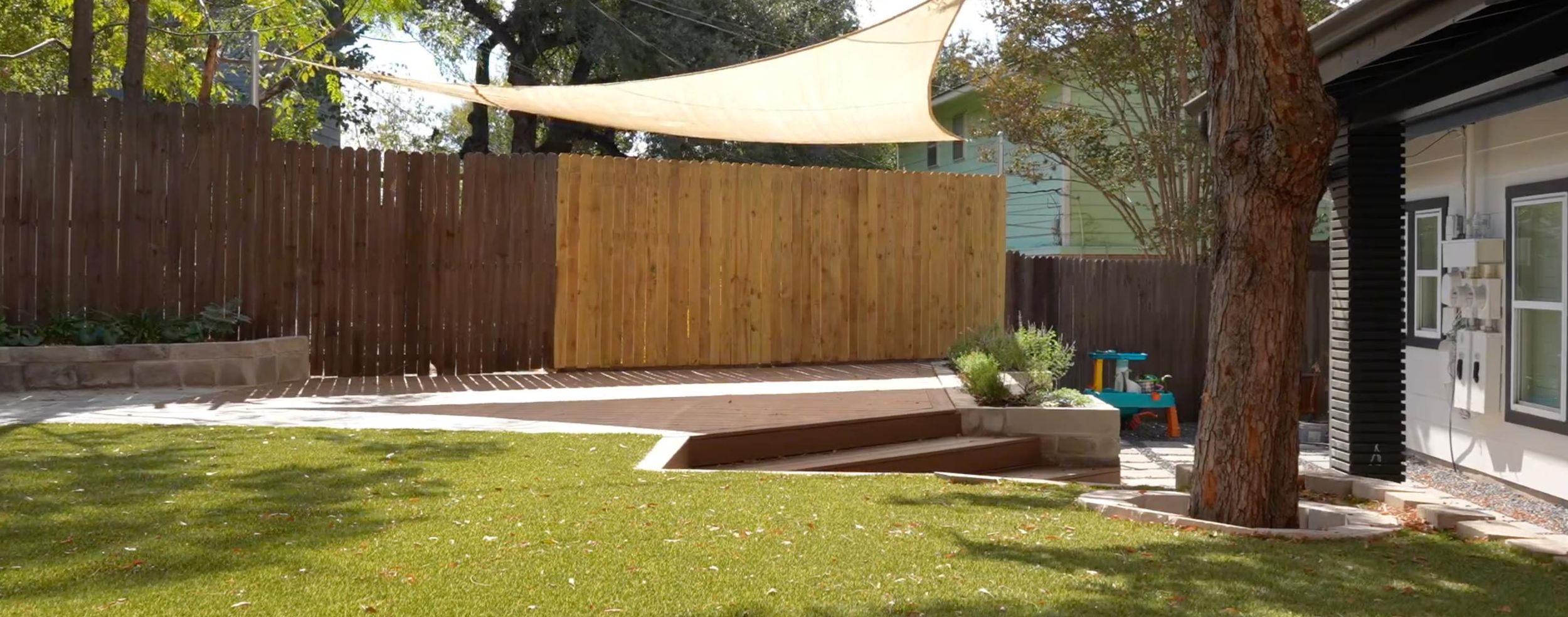 Gem Court backyard transformation with paver patio and poolside landscaping in Austin